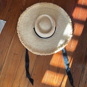 Hat- frayed raffia edging and trimmed with black gross grain ribbon